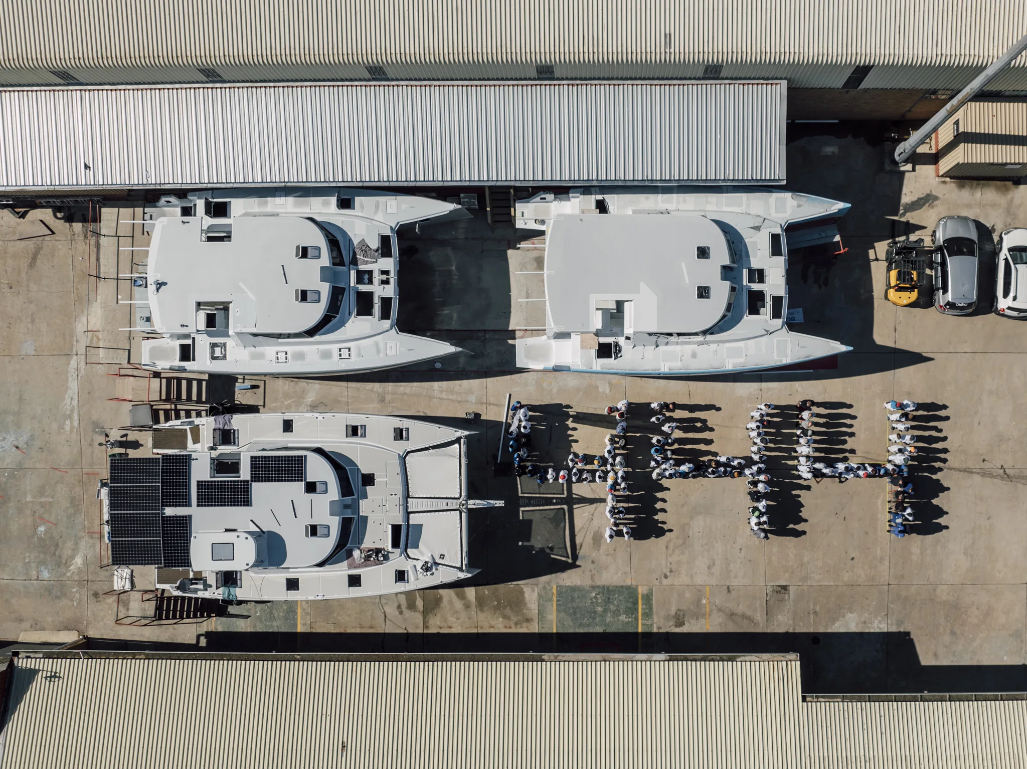 Three Vision hulls under construction, seen from above